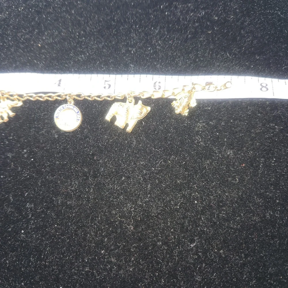 Vintage North Carolina Zoo Gold Tone Animal Charm Bracelet Giraffe Elephant Bear